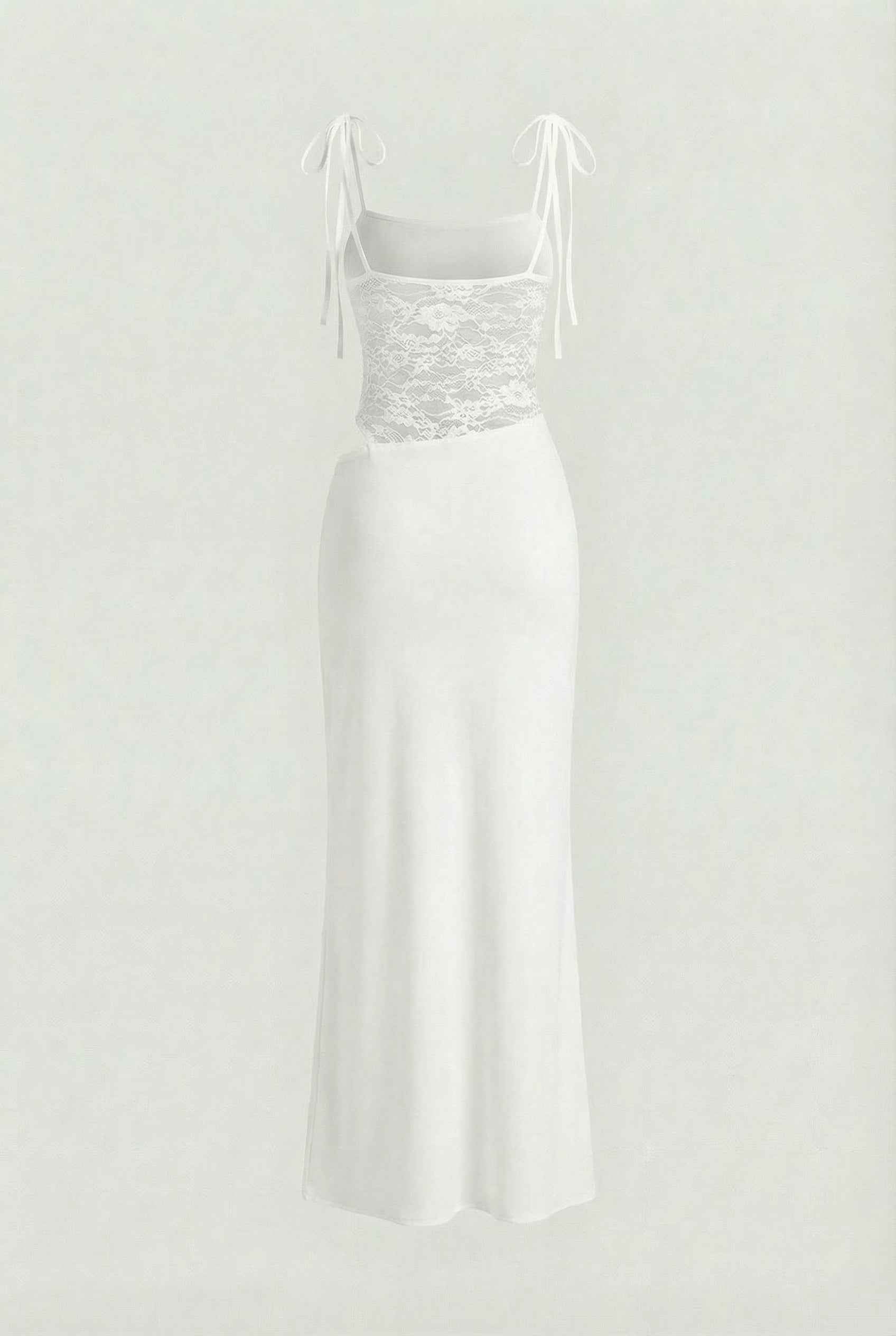 White women's dress by Lumina Wear featuring elegant lace details and a flattering silhouette.