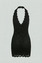 Black Isabella lace mini dress by Lumina Wear, featuring elegant lace details and a comfortable fit, perfect for stylish occasions.