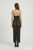 White lace maxi dress by Lumina Wear featuring a flattering fit and elegant design, perfect for formal occasions.