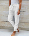Lightweight beige linen trousers from Lumina Wear featuring a relaxed fit and elegant design, perfect for casual or office wear.