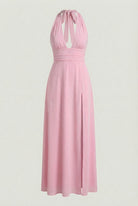 Elegant pink women's dress by Lumina Wear featuring a versatile cut, perfect for stylish occasions.