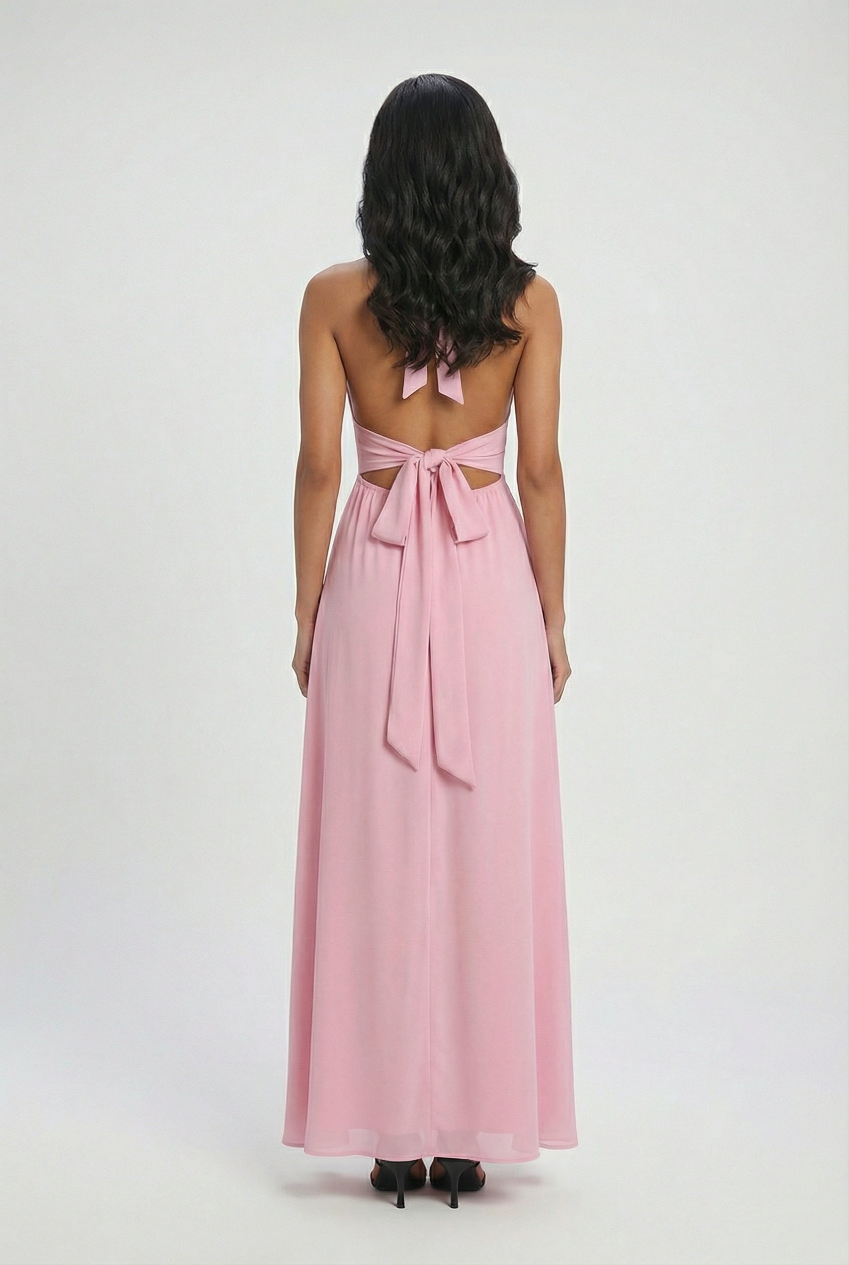 Elegant pink women's dress by Lumina Wear, featuring a versatile cut and feminine design, perfect for stylish occasions.