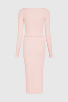 Elegant pink maxi skirt set by Lumina Wear with sophisticated fit, featuring flowing fabric and stylish design.