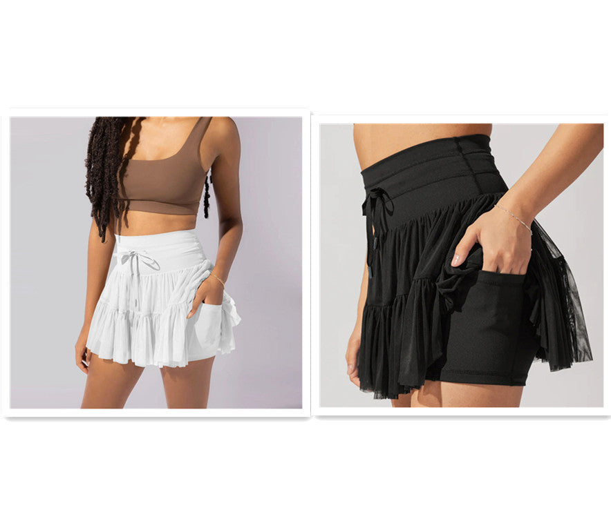 Light brown Isabella elegant pleated mini skirt with integrated shorts from Lumina Wear, showcasing a stylish and comfortable design.