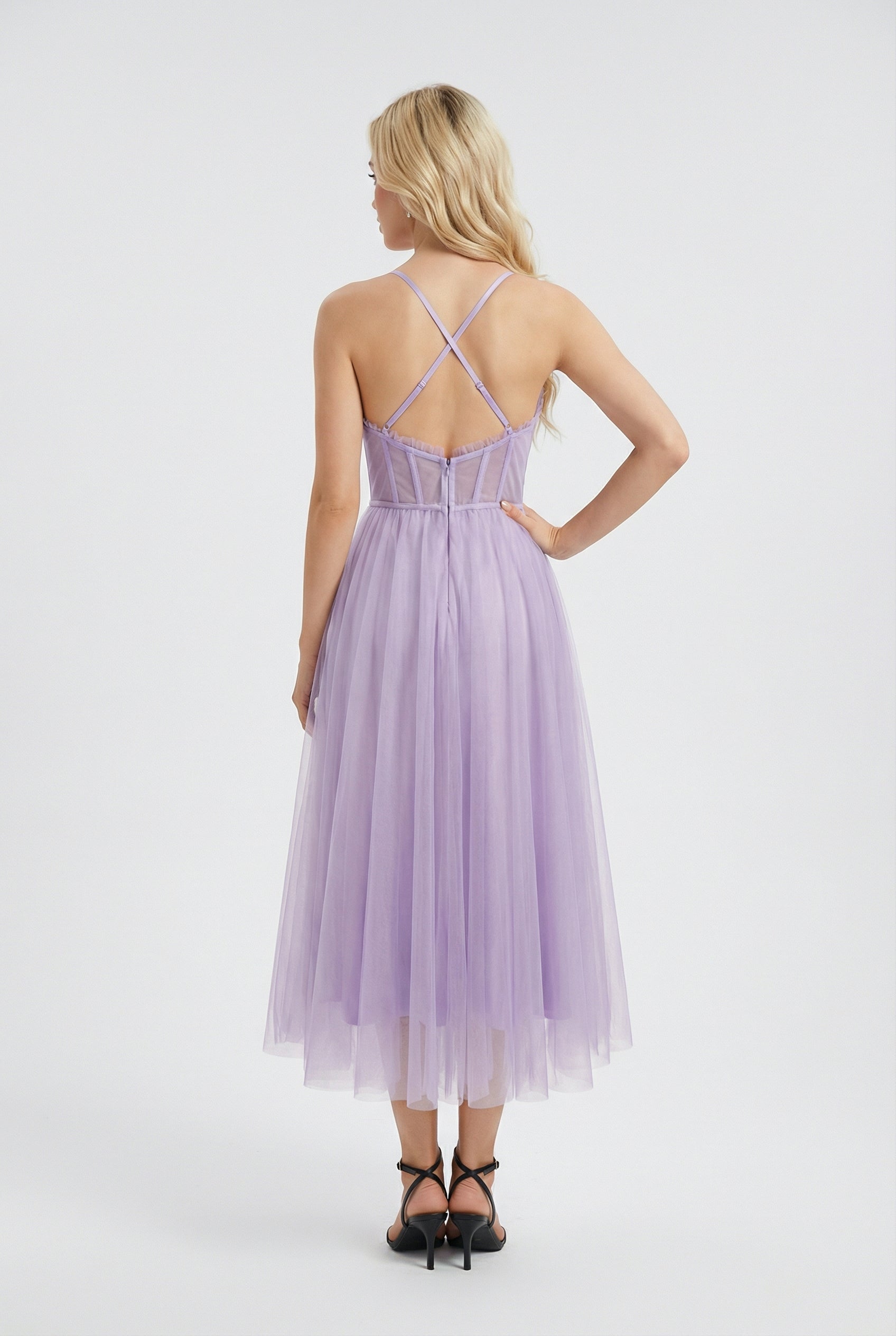 Elegant purple midi dress by Lumina Wear featuring a flattering silhouette, perfect for stylish occasions.