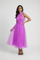 Elegant purple midi dress by Lumina Wear featuring a versatile cut, perfect for women's fashion and special occasions.