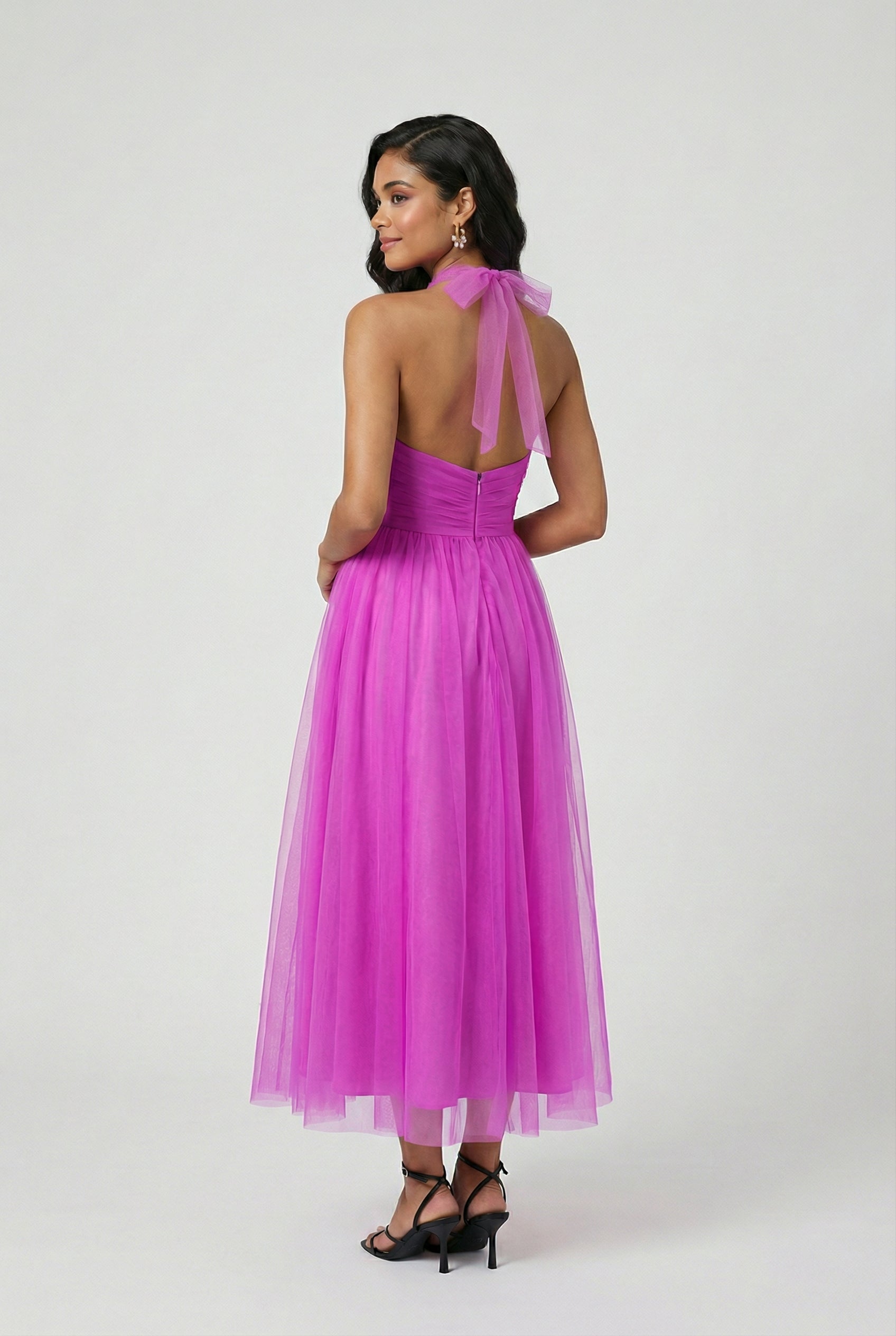 Elegant purple midi dress by Lumina Wear featuring a versatile cut, perfect for women's fashion and special occasions.