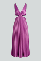 Elegant purple pleated wedding guest dress by Lumina Wear featuring a fluid drape and sophisticated design.
