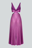 Elegant purple pleated wedding guest dress by Lumina Wear, featuring a fluid drape and sophisticated design.
