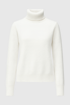 Elegant white turtleneck sweater by Lumina Wear, slim fit design perfect for casual or stylish winter looks.