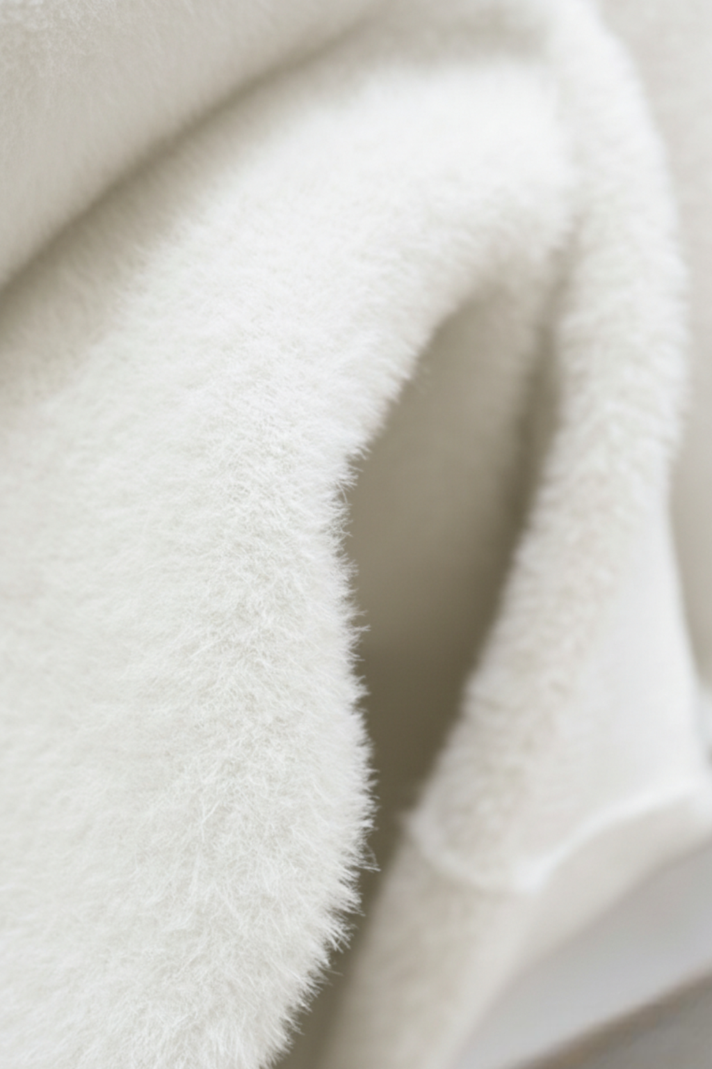 Elegant white turtleneck sweater by Lumina Wear featuring a slim fit and cozy design, perfect for stylish winter outfits.