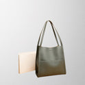 Brown Isabella structured leather shoulder handbag by Lumina Wear, featuring a spacious design and elegant craftsmanship.