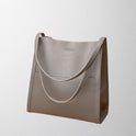 Brown Lumina Wear Isabella structured leather shoulder handbag with spacious interior and elegant design.