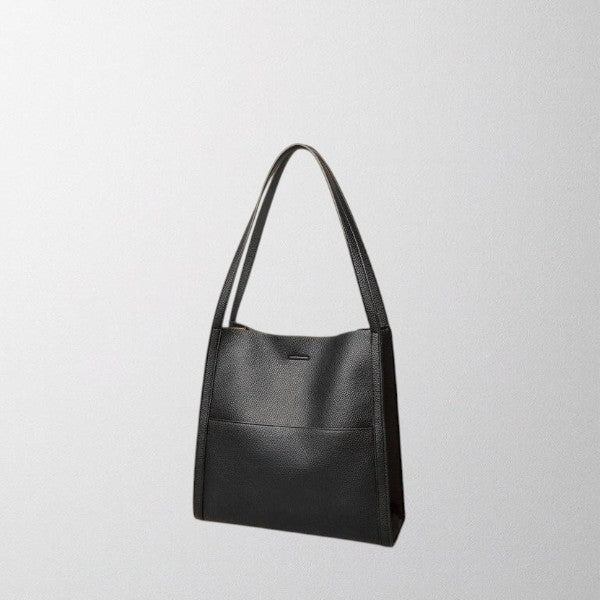 Brown Isabella Lumina structured leather shoulder bag with spacious interior, stylish design, and elegant craftsmanship.