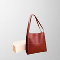 Lumina Wear Isabella leather shoulder handbag in brown with a structured, spacious design and elegant style.