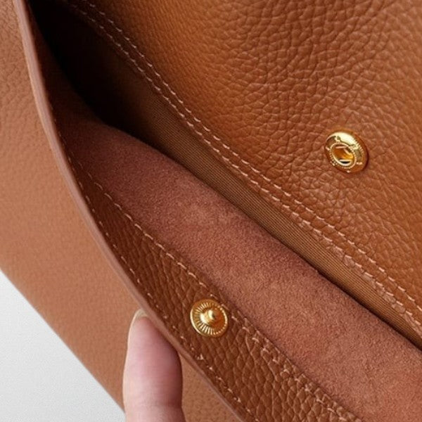Lumina Wear Isabella structured leather shoulder bag in brown with spacious design and elegant craftsmanship.
