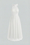 Elegant white midi dress by Lumina Wear, featuring a flattering silhouette and timeless style for women's fashion.