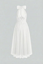 Elegant white midi dress by Lumina Wear featuring a flattering silhouette, perfect for women’s stylish occasions.