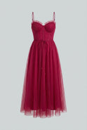 Elegant wine red midi dress by Lumina Wear featuring a versatile cut, perfect for women’s stylish occasions.