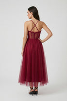 Elegant wine red midi dress by Lumina Wear, featuring a versatile cut and stylish design for women.