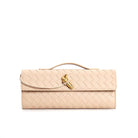 Elegant woven brown Lumina handbag with adjustable strap, stylish and versatile for everyday wear.
