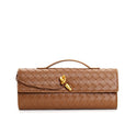 Elegant woven brown Lumina handbag with adjustable strap, featuring a stylish design and versatile carry options.