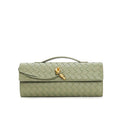 Elegant woven brown handbag with adjustable strap by Lumina Wear, featuring a stylish design and versatile carry options.