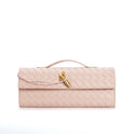 Elegant woven brown Lumina handbag with adjustable strap, featuring a stylish design and versatile carry options.