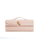 Elegant woven brown handbag with adjustable strap from Lumina Wear, featuring stylish design and versatile carry options.