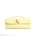 Elegant brown woven handbag with adjustable strap by Lumina Wear, featuring a stylish design and versatile carry options.