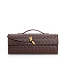 Elegant woven brown Lumina handbag with adjustable strap, featuring a stylish design and spacious interior.