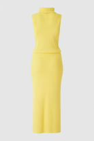Elegant yellow knit skirt and top set for women by Lumina Wear, featuring a flattering fit in a stylish, coordinated design.