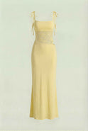 Elegant yellow lace summer dress by Lumina Wear featuring a versatile fit, perfect for warm weather and stylish summer occasions.