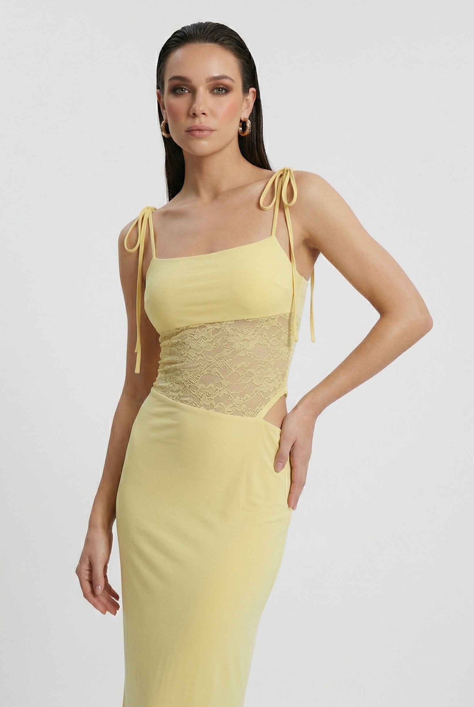 Elegant yellow lace summer dress by Lumina Wear, featuring a versatile fit and feminine design for women's dresses.