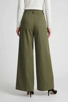 Isabella Lumina green palazzo pants with flowy design and stretch fabric, featuring wide-leg silhouette and comfortable fit.