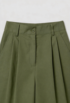 Isabella Lumina green palazzo pants with flowy design and stretch fabric, featuring wide-leg style and comfortable fit.