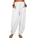 Isabella Lumina high-waisted black harem trousers with a casual fit, featuring a relaxed silhouette and lightweight fabric.