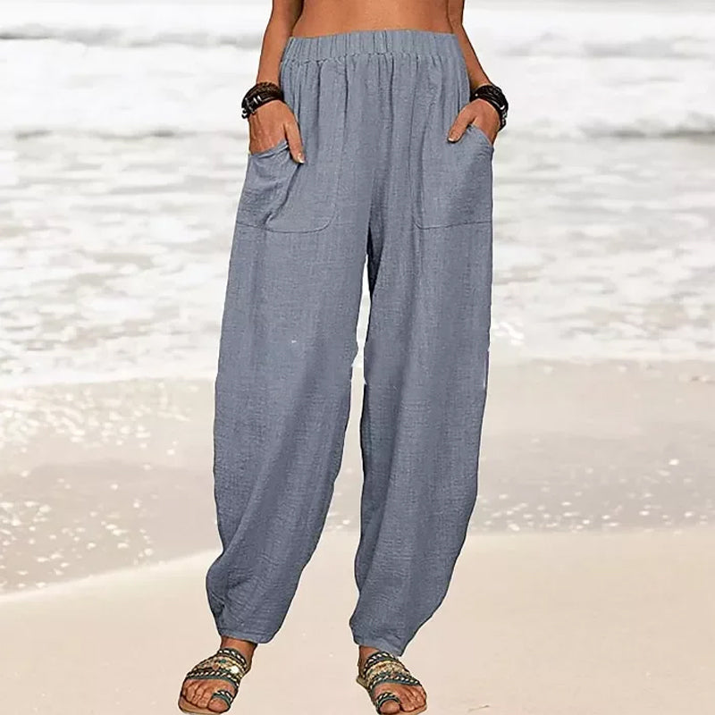 Isabella high-waisted black harem trousers with casual fit by Lumina Wear, featuring a relaxed and comfortable style.