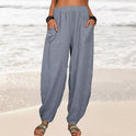 Isabella high-waisted black harem trousers with casual fit by Lumina Wear, shown in a relaxed fit with soft fabric.
