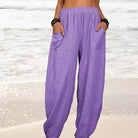 Isabella high-waisted black harem trousers by Lumina Wear featuring a casual fit and relaxed style, shown on a white background.