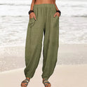 Isabella Lumina Wear high-waisted black harem trousers with a casual fit, featuring a relaxed and stylish design.