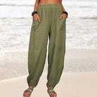 Isabella Lumina high-waisted black harem trousers with a casual fit, featuring a relaxed style and comfortable design.