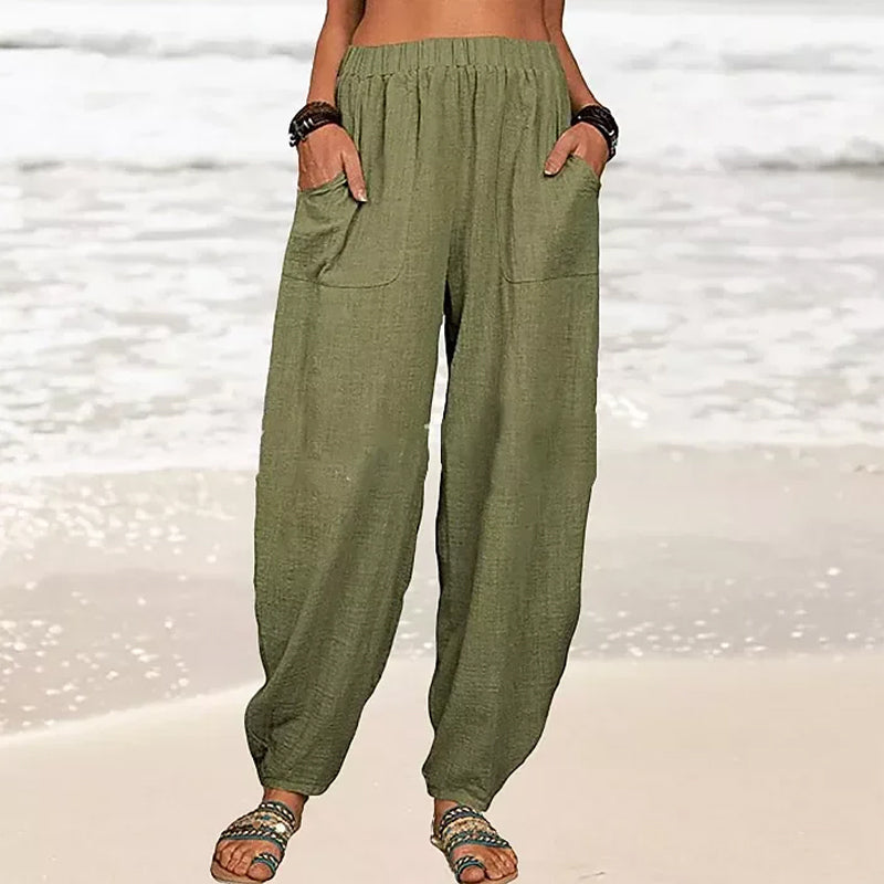Isabella Lumina high-waisted black harem trousers with a casual fit, featuring a relaxed style and comfortable design.