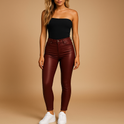 Black Isabella Lumina Wear high-waisted stretch slim fit trousers, tailored and stylish in a close-up view.