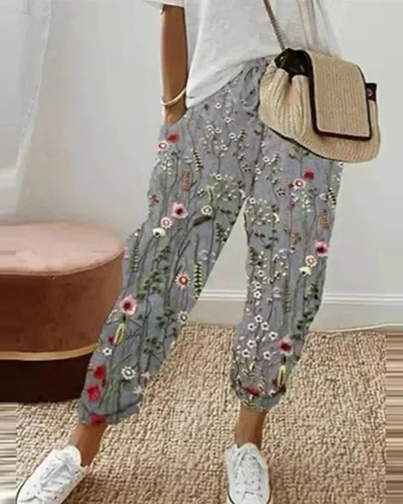 Isabella Lumina Wear lightweight breathable grey linen trousers, multicolor design, size 34, stylish and comfortable for everyday wear.