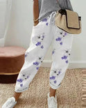 Isabella Lumina lightweight grey linen trousers with breathable fabric, relaxed fit, and multicolor accents for casual wear.