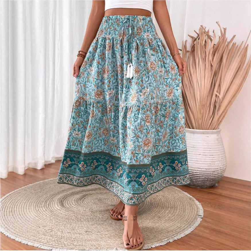 Lightweight floral maxi skirt with layered design from Lumina Wear, in green, featuring flowing fabric and elegant style.