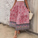 Lightweight floral maxi skirt by Lumina Wear, layered design in green, flowing and elegant for casual or dressy occasions.