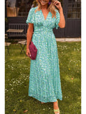 Orange Isabella Maxi Dress by Lumina Wear, elegant evening dress with flowing fabric and sweetheart neckline for wedding guest attire.
