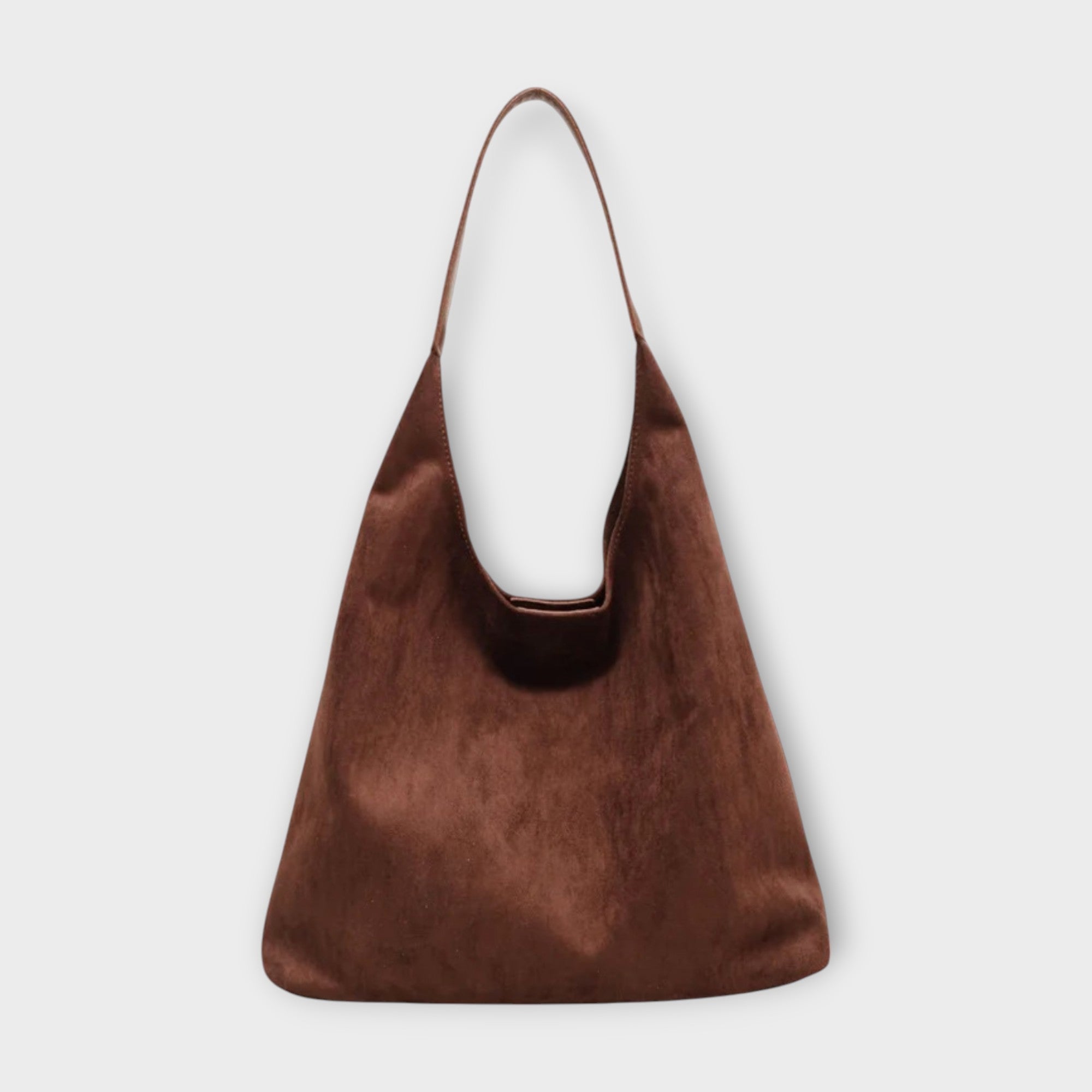 Brown Isabella Lumina Wear minimalist slouch handbag with soft structure, featuring a relaxed, contemporary design.